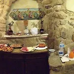 Del Centro إينّا